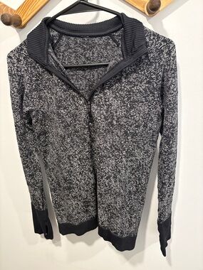 lululemon Rest Less 1/2 Zip pullover in a black and white textured pattern.